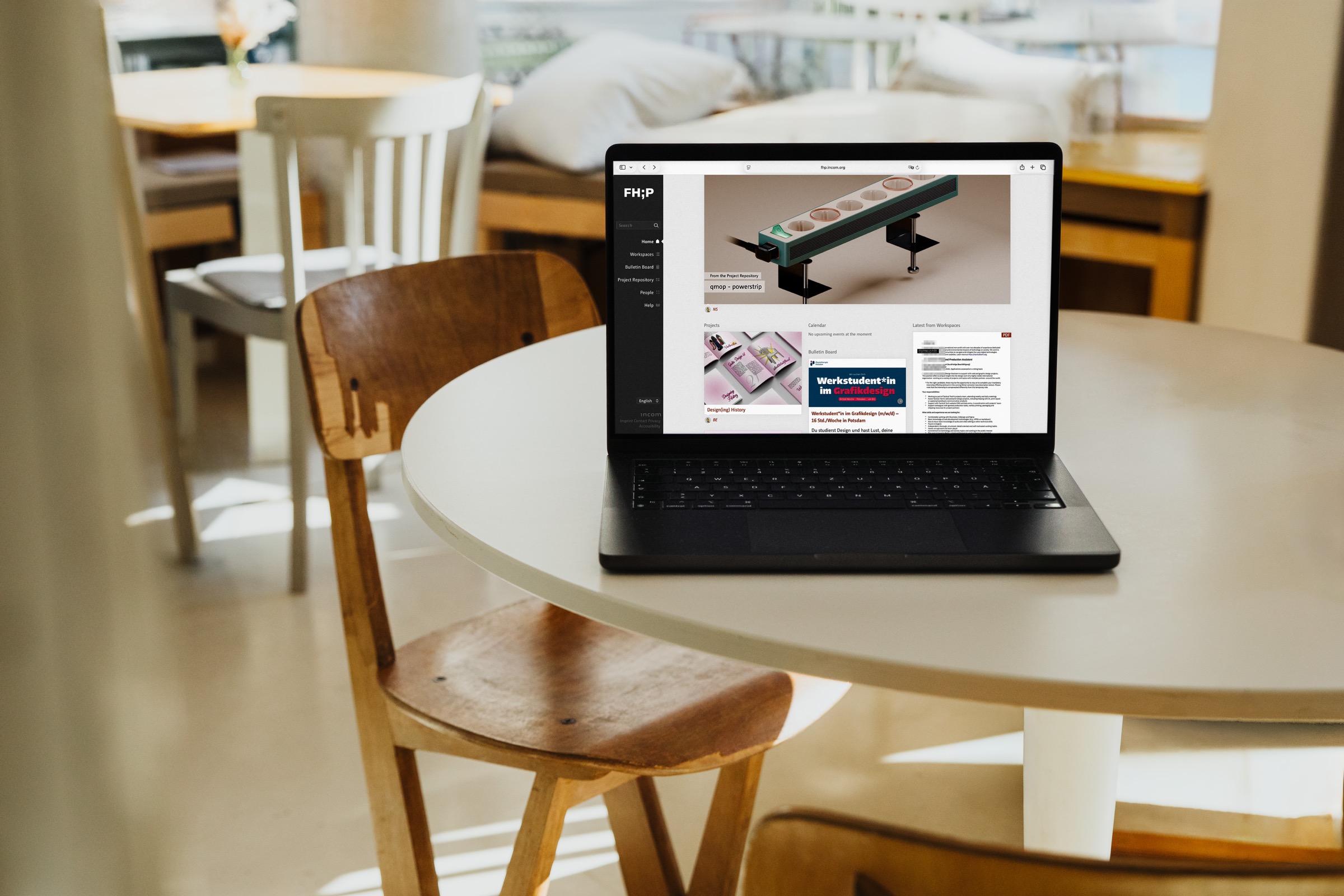 Person working focused on a laptop with the Incom platform